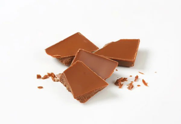 Milk chocolate pieces — Stock Photo, Image