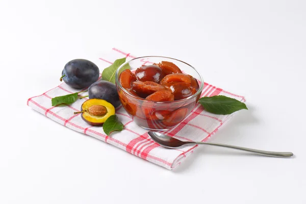 Bowl of plum compote — Stock Photo, Image