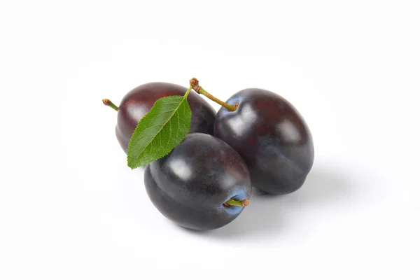 Three ripe plums — Stock Photo, Image