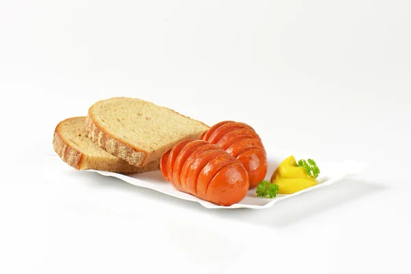 Sausages and bread — Stock Photo, Image