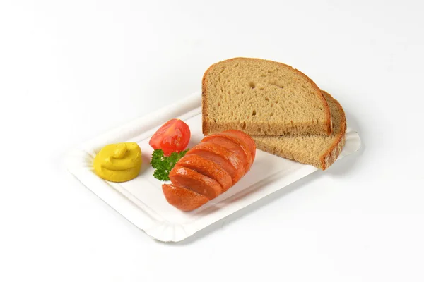 Roasted sausage, mustard and bread — Stock Photo, Image