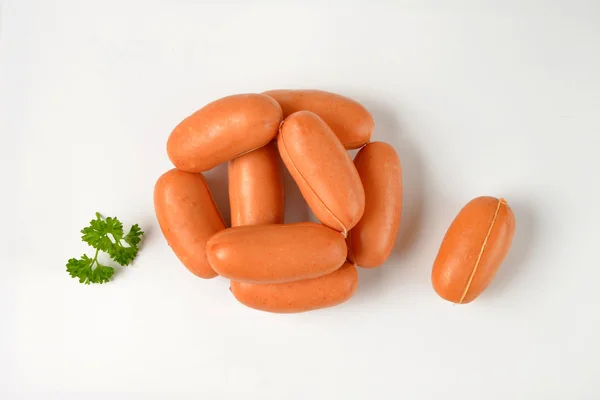 Raw short sausages — Stock Photo, Image