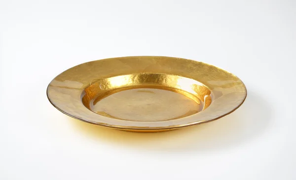 Empty gold plate — Stock Photo, Image