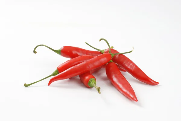 Červené chilli papričky — Stock fotografie