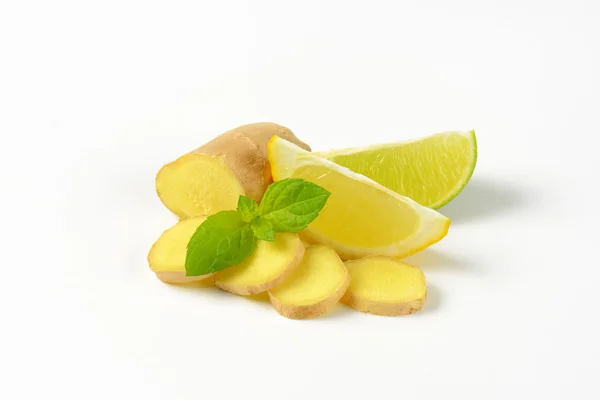 Sliced ginger with lemon and lime — Stock Photo, Image