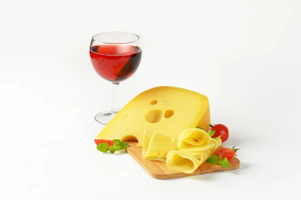 Swiss cheese and red wine — Stock Photo, Image