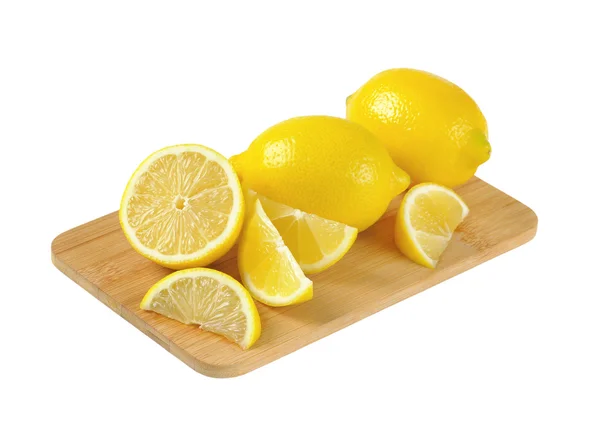 Limoni interi e tagliati a fette — Foto Stock