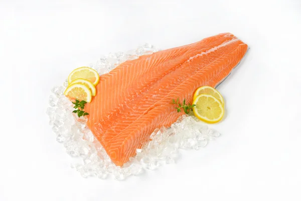 Raw salmon fillet on ice — Stock Photo, Image