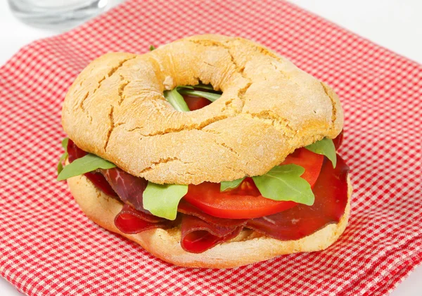 Friselle bread roll with smoked beef — Stock Photo, Image