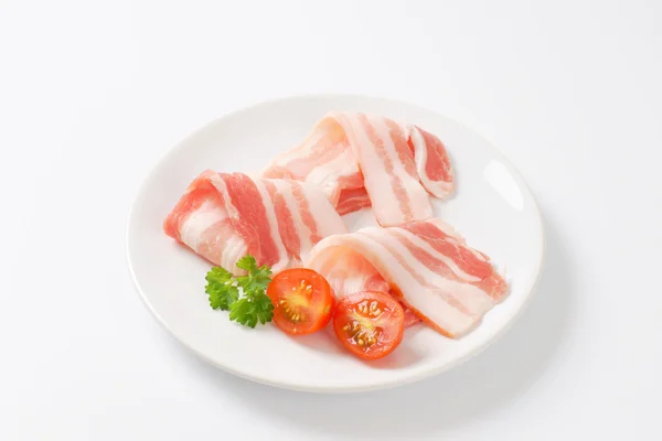 Thin slices of raw side pork — Stock Photo, Image