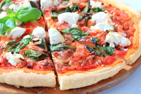 Pizza with cheese, bacon and spinach — Stock Photo, Image