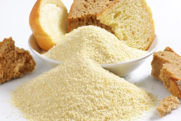 Stale bread and finely ground breadcrumbs — Stock Photo, Image