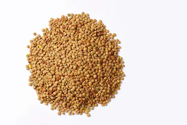 Pile of brown lentils — Stock Photo, Image