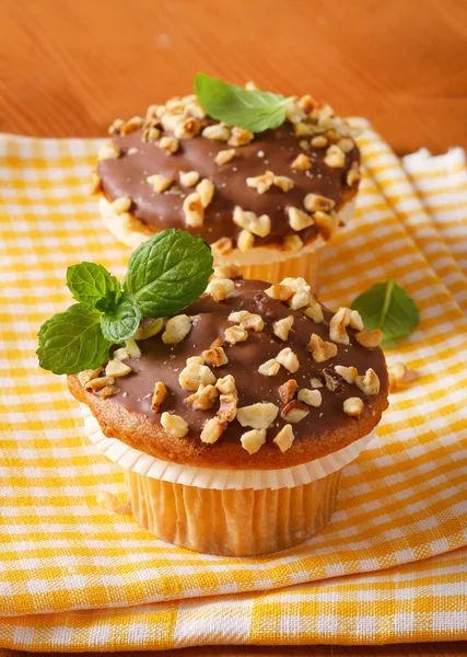 Chocolate glazed muffins — Stock Photo, Image
