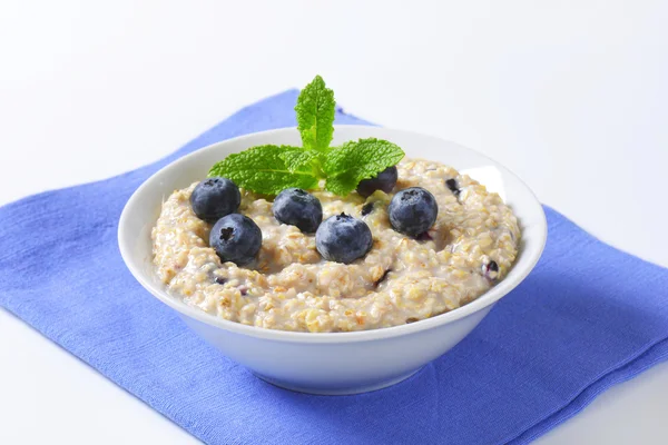 Whole grain oat porridge — Stock Photo, Image