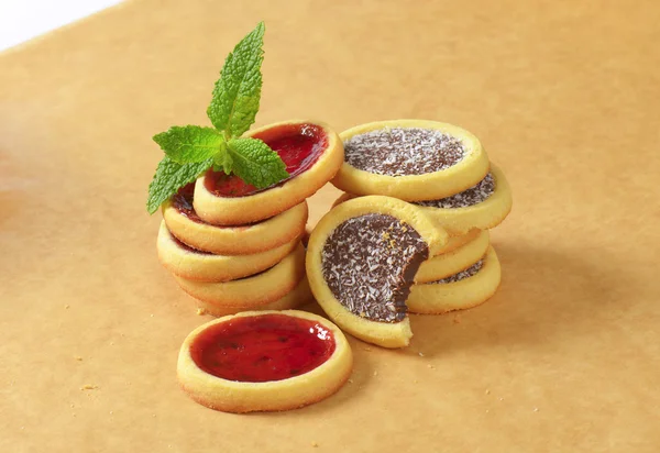 Jam  and chocolate filled tartlets — Stock Photo, Image