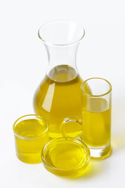 Olive oil in glass vessels — Stock Photo, Image