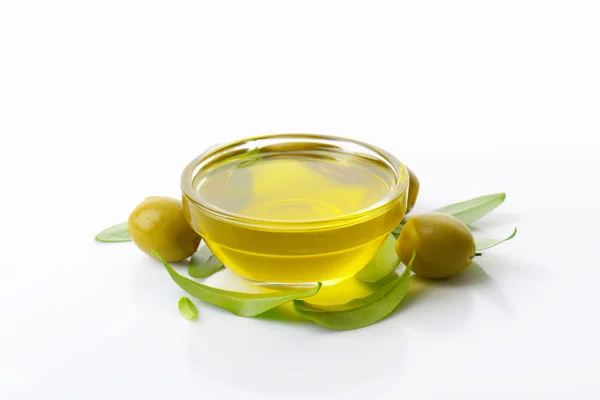 Olive oil and green olives — Stock Photo, Image