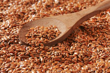 Brown flax seeds background clipart