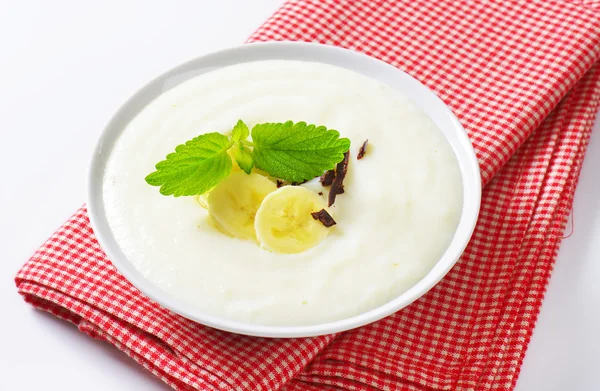 Semolina pudding with banana — Stock Photo, Image