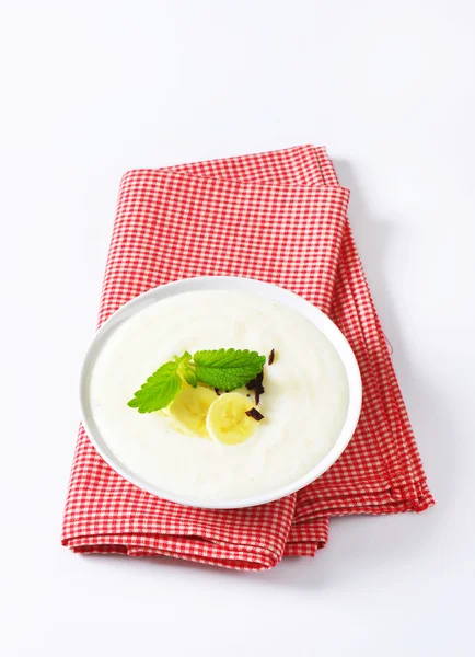 Semolina pudding with banana — Stock Photo, Image