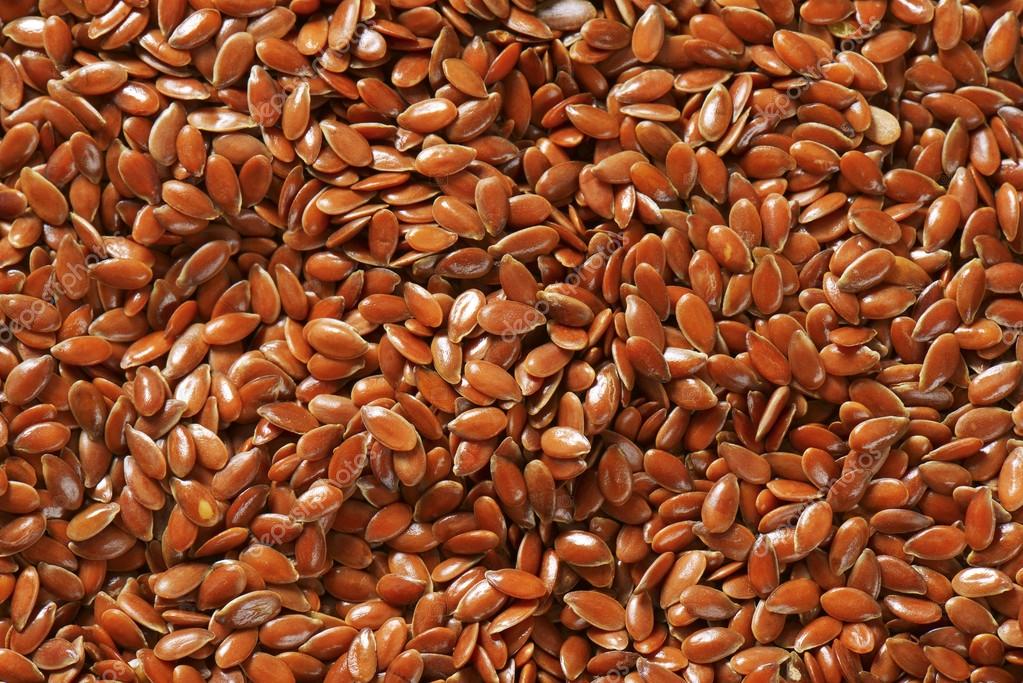 Brown flax seeds background — Stock Photo © ajafoto 61660677