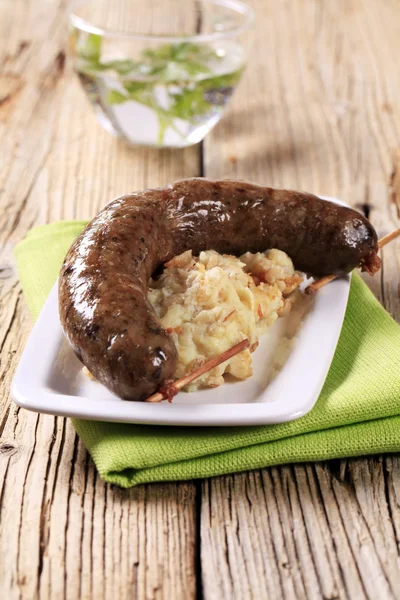 Roasted sausage with barley mashed potato — Stock Photo, Image