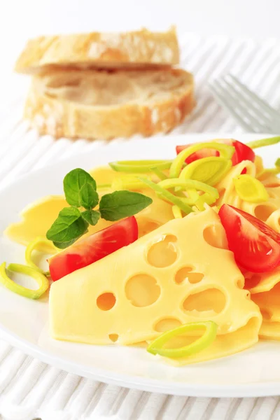 Thin-sliced Swiss cheese — Stock Photo, Image