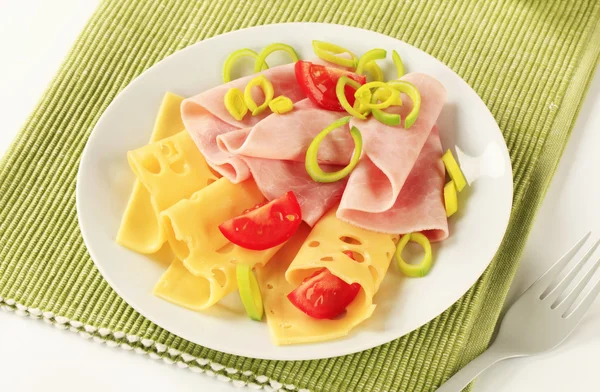 Slices of ham and Swiss cheese — Stock Photo, Image