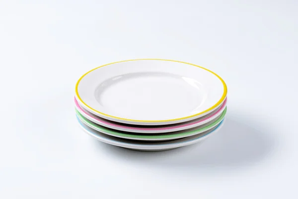 Set of four dinner plates — Stock Photo, Image