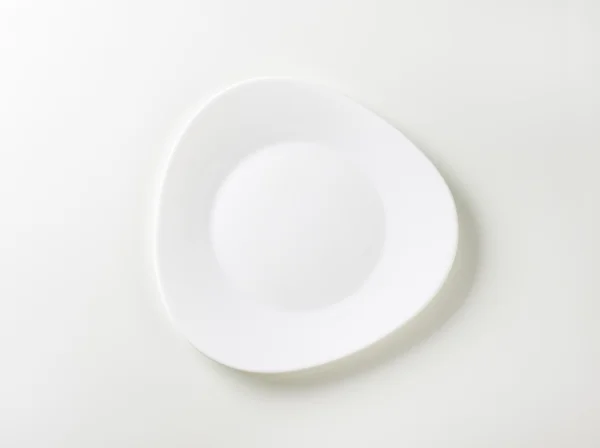 Trendy triangle white plate — Stock Photo, Image