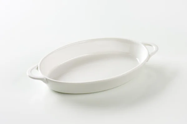 Oval white ceramic dish — Stock Photo, Image