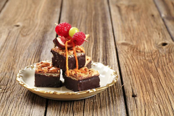 Peanut wafer squares half coated with chocolate — Stock Photo, Image