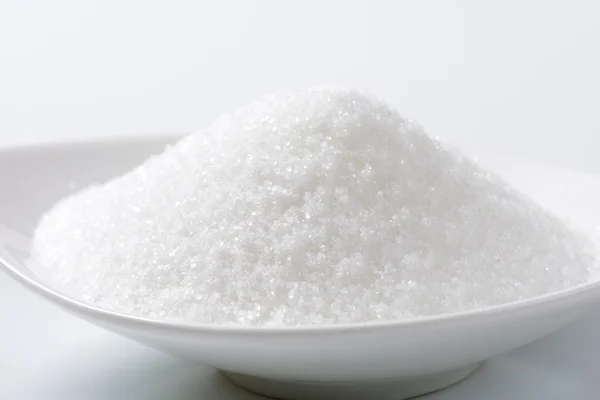 Tigela de açúcar granulado — Fotografia de Stock