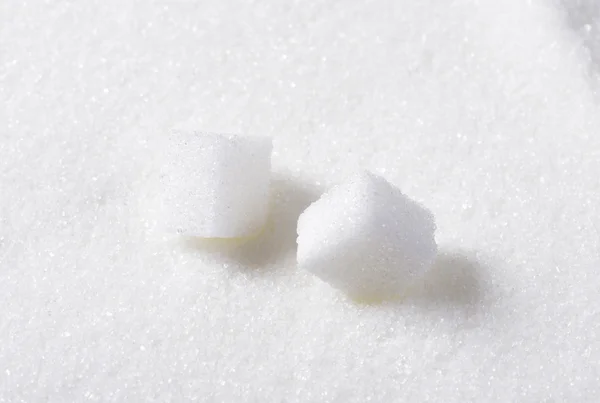 Zwei weiße Zuckerwürfel — Stockfoto