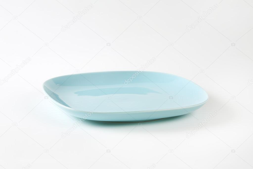 Light blue square plate Stock Photo by ©ajafoto 66909561