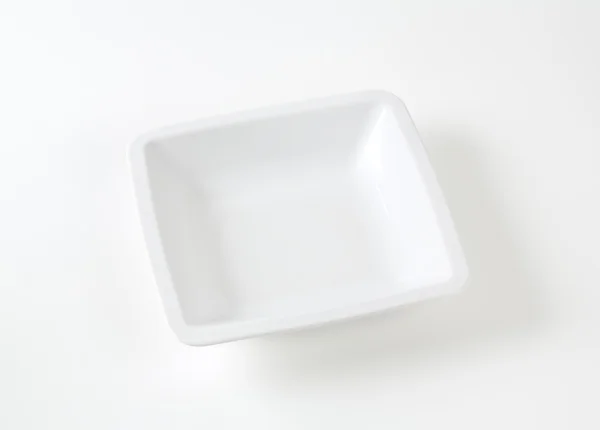 Small rimmed square white serving bowl — Stock Photo, Image