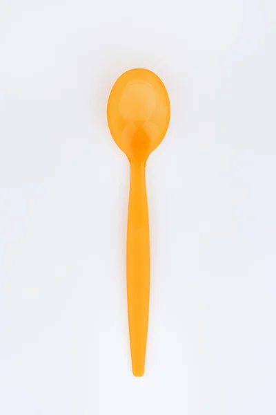 Orange Plastic Spoon — Stock Photo, Image