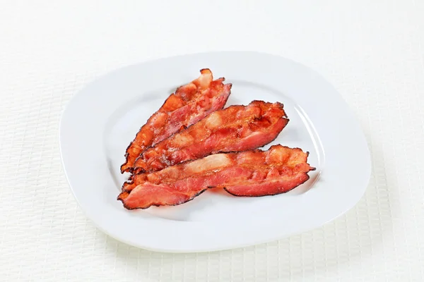 Tiras de bacon fritas — Fotografia de Stock