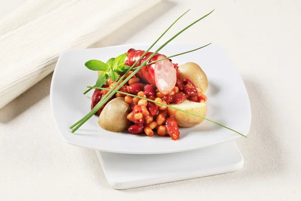 Bean and corn chili with sausage and potatoes — Stock Image Bean and corn chili with sausage and potatoes Stock Photo