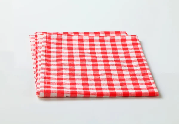 Roupa de mesa vermelha e branca — Fotografia de Stock