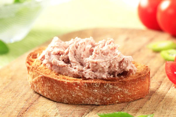 Toasted bread with meat spread — Stock Photo, Image