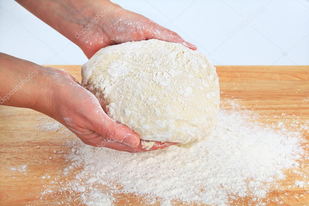 Cook preparing yeast dough