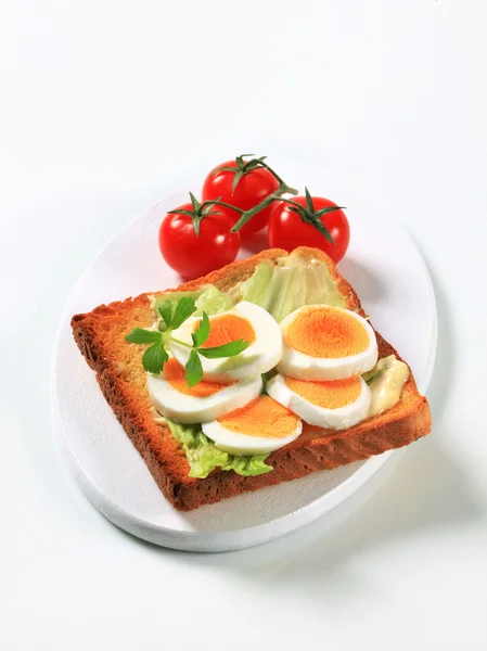 Open faced egg sandwich — Stock Photo, Image