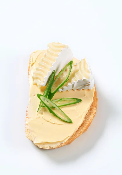 Bread with butter and cheese — Stock Photo, Image