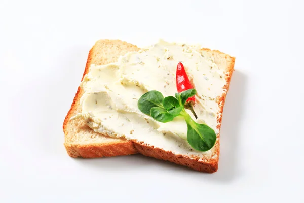 White bread with cheese spread — Stock Photo, Image