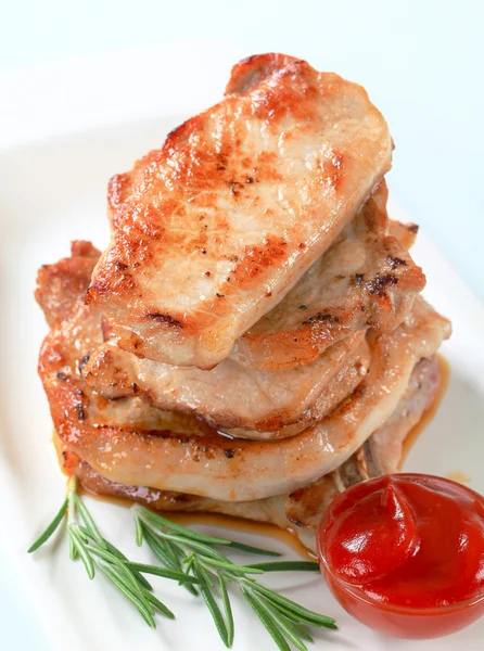 Pork cutlets and tomato sauce — Stock Photo, Image