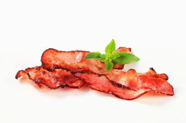 Pan fried bacon strips clipart