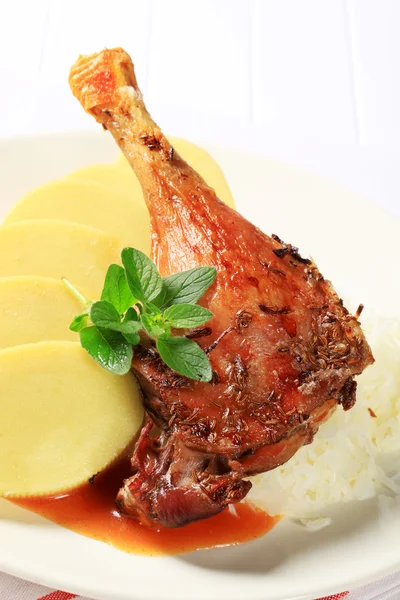 Roast duck with potato dumplings and sauerkraut — Stock Photo, Image