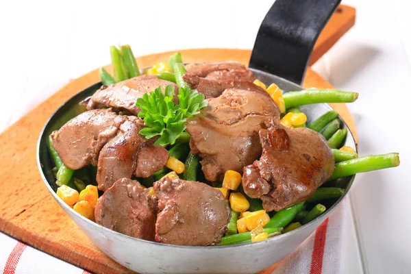 Chicken livers with green beans and corn — Stock Photo, Image